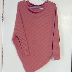 Sweater with a slouchy fit size small mauve in color
